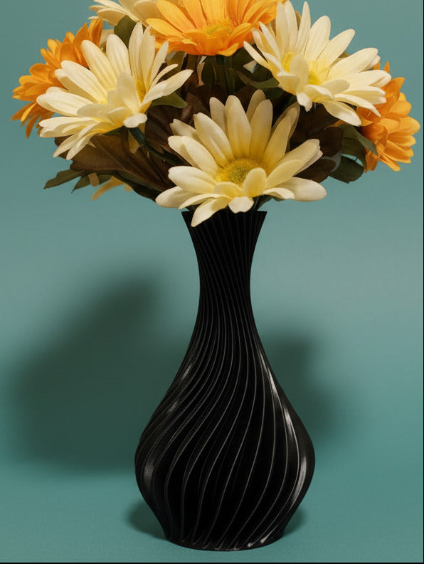 Twisted Vase in Black with Assorted Silk Flowers in Orange. White, & Yellow